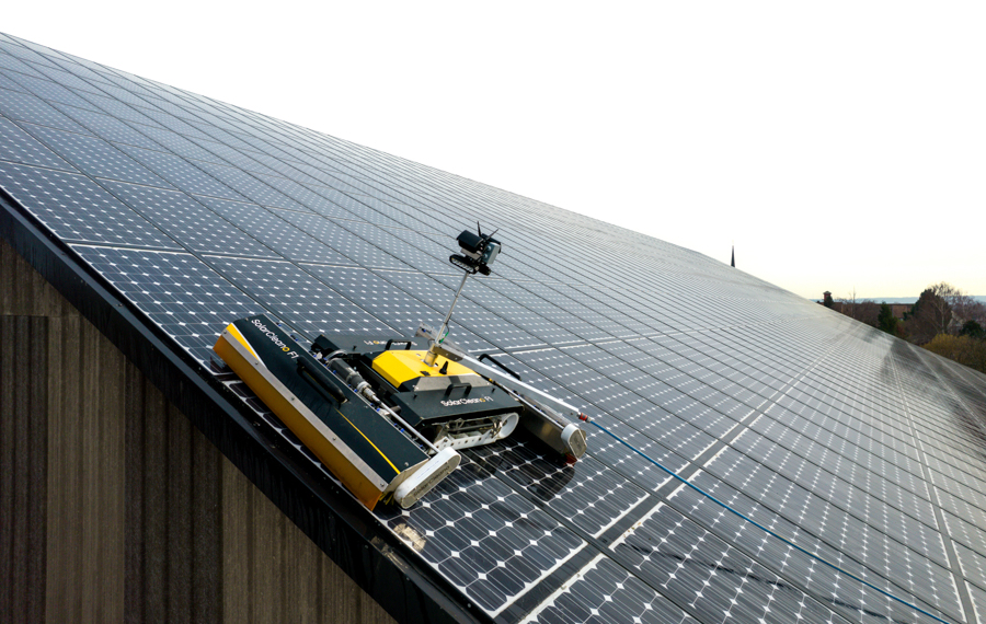 Solar robot climbing slopes of solar installations