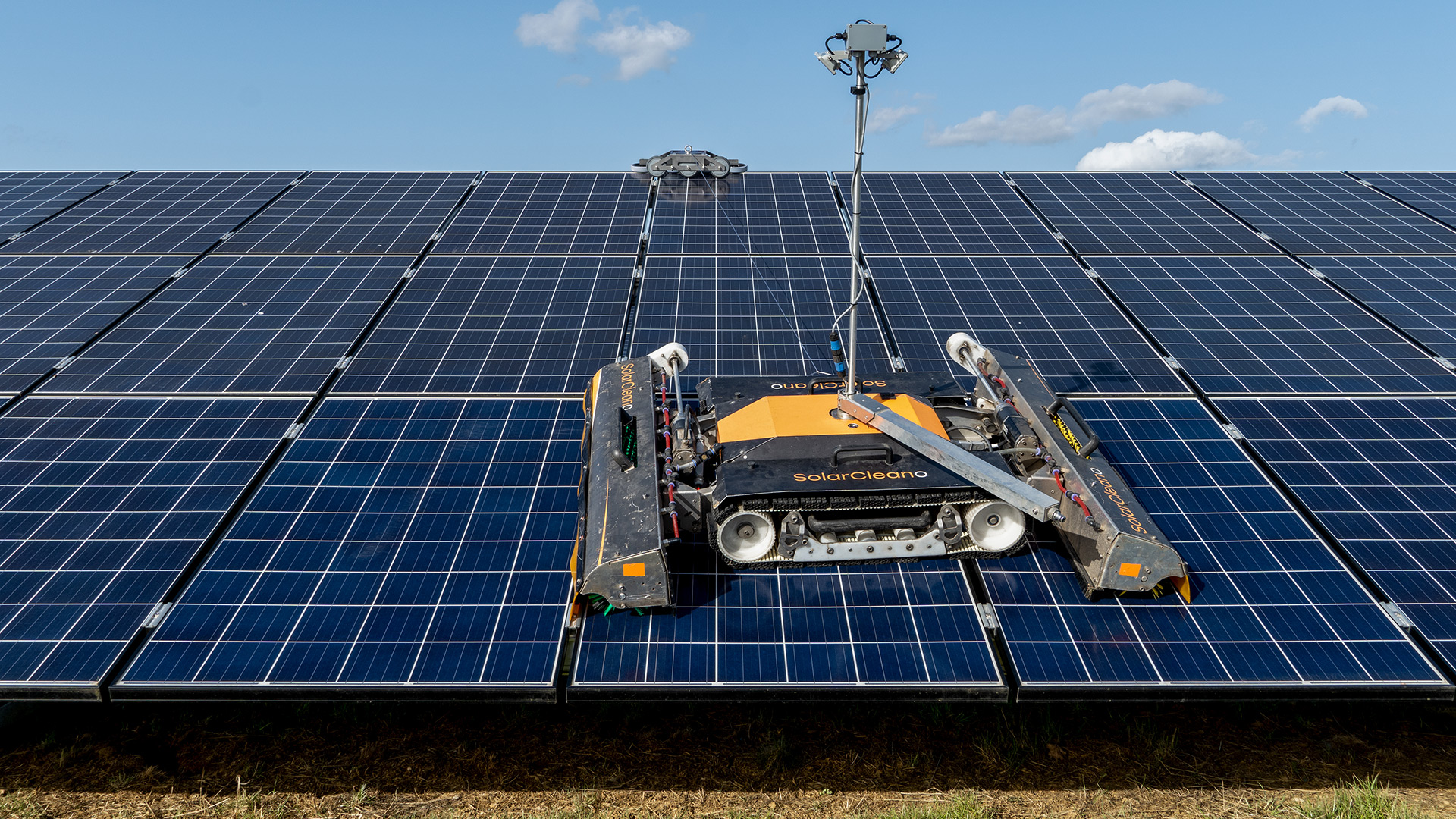 safe solar panel cleaning with robotic cleaner and safety glider